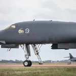 A US Air Force B-1 Lancer bomber is pictured on the tarmac at RAF Fairford base in Fairford, south-west England on Sept 27, 2026, as UK counter-terrorism police investigate an incident near the base in the village of Whelford.