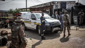 Gunmen kill 27 in 2 separate shootings in South Africa.