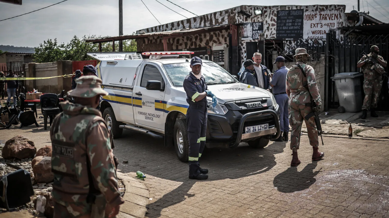Gunmen kill 27 in 2 separate shootings in South Africa.