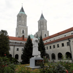 Priest killed and four injured in knife attack at Polish abbey.