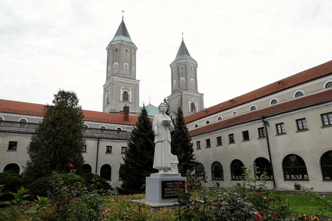 Priest killed and four injured in knife attack at Polish abbey.