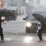 Millions urged to evacuate as powerful Typhoon Dujuan hits Japan.