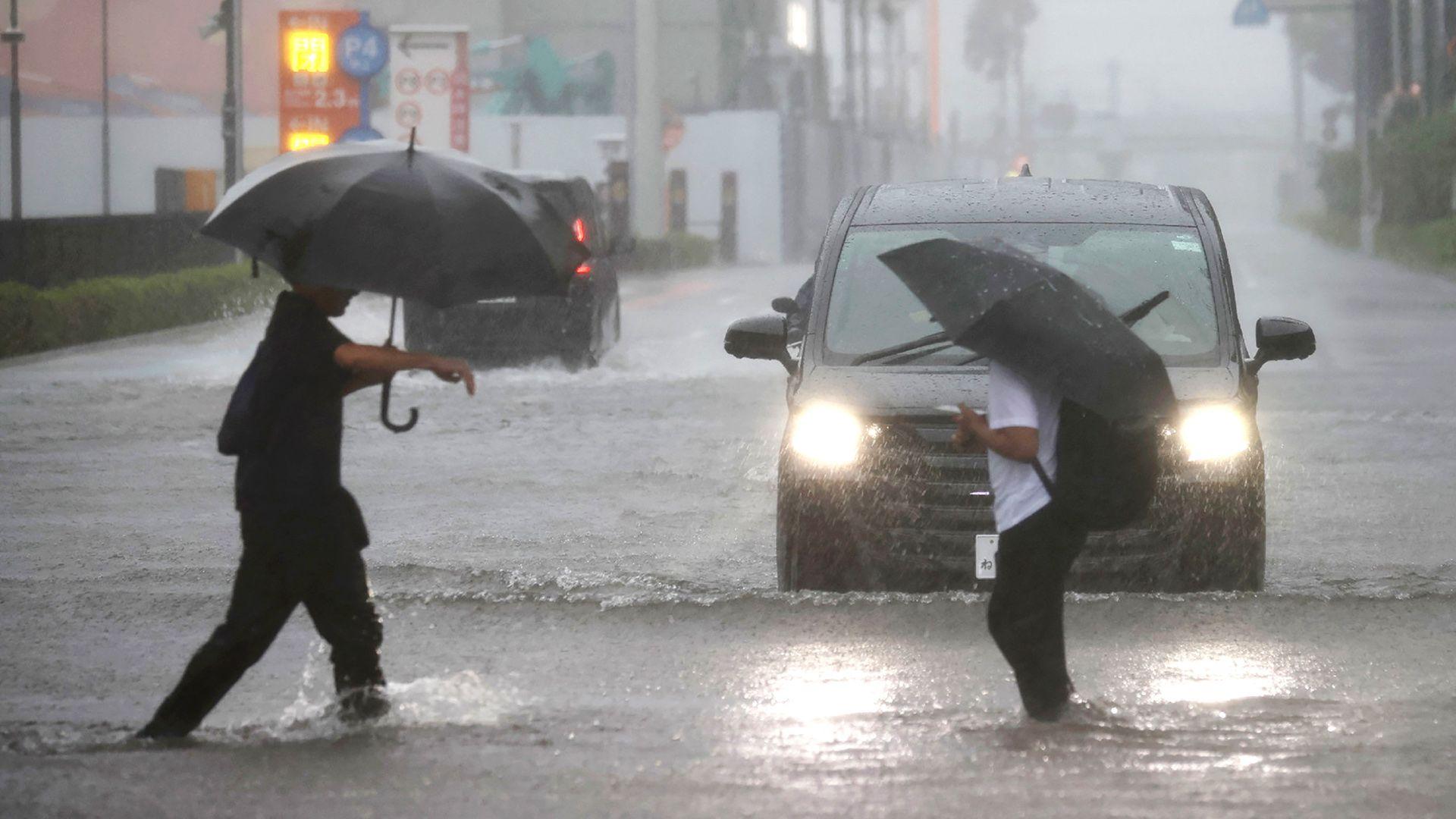 Millions urged to evacuate as powerful Typhoon Dujuan hits Japan.