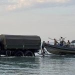 Senior Kazakh officials detained after 14 service members swept out to sea.