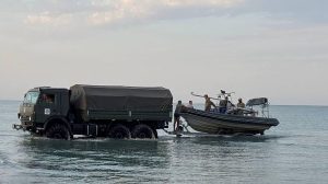 Senior Kazakh officials detained after 14 service members swept out to sea.