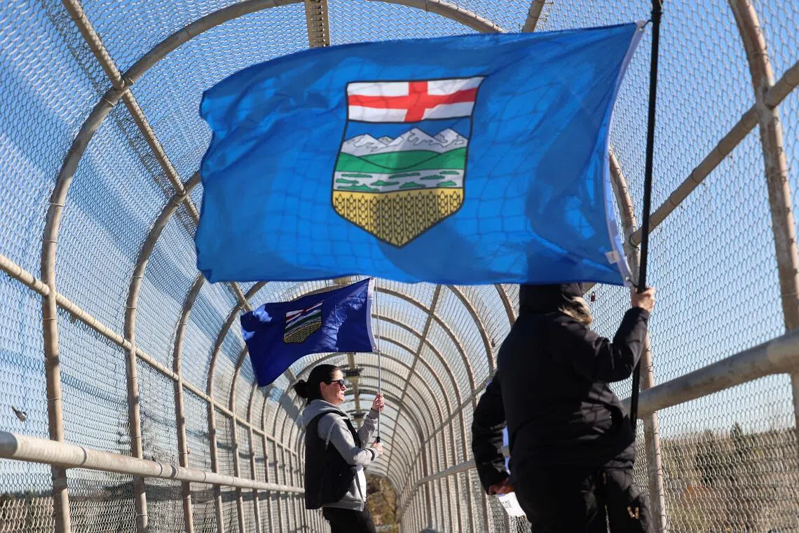 Oil-rich Alberta votes on Canada breakup.