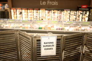 View of the closed frozen food aisle at a supermarket near Nantes after a cyberattack targeted refrigeration systems at French supermarket chains, causing food losses and fires at several stores, France, October 12, 2026.