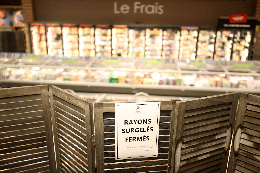 View of the closed frozen food aisle at a supermarket near Nantes after a cyberattack targeted refrigeration systems at French supermarket chains, causing food losses and fires at several stores, France, October 12, 2026.