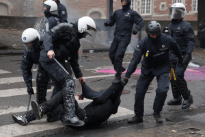 Police detain a demonstrator as student protesters join a nationwide strike against the Belgian government's austerity measures and budget cuts, in Brussels, Belgium, October 9, 2026.
